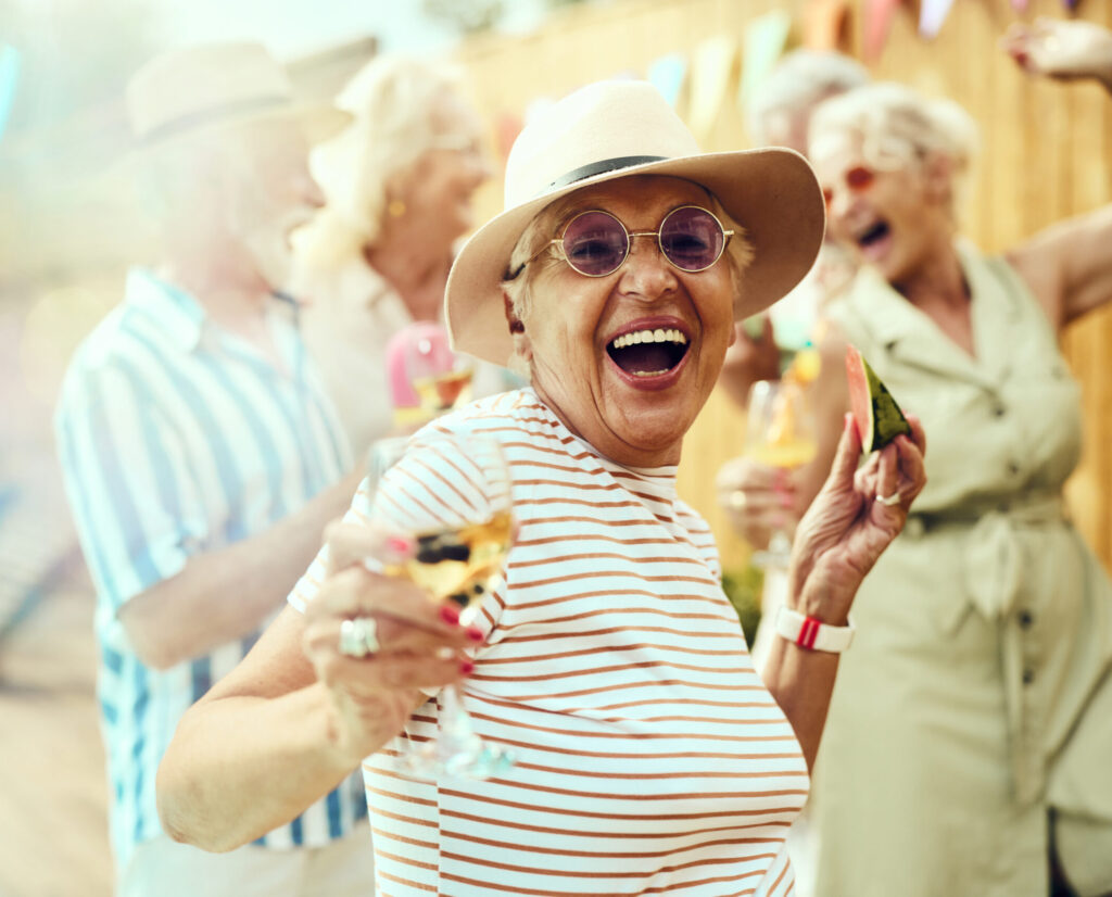 Dental implant example with a happy woman at a party
